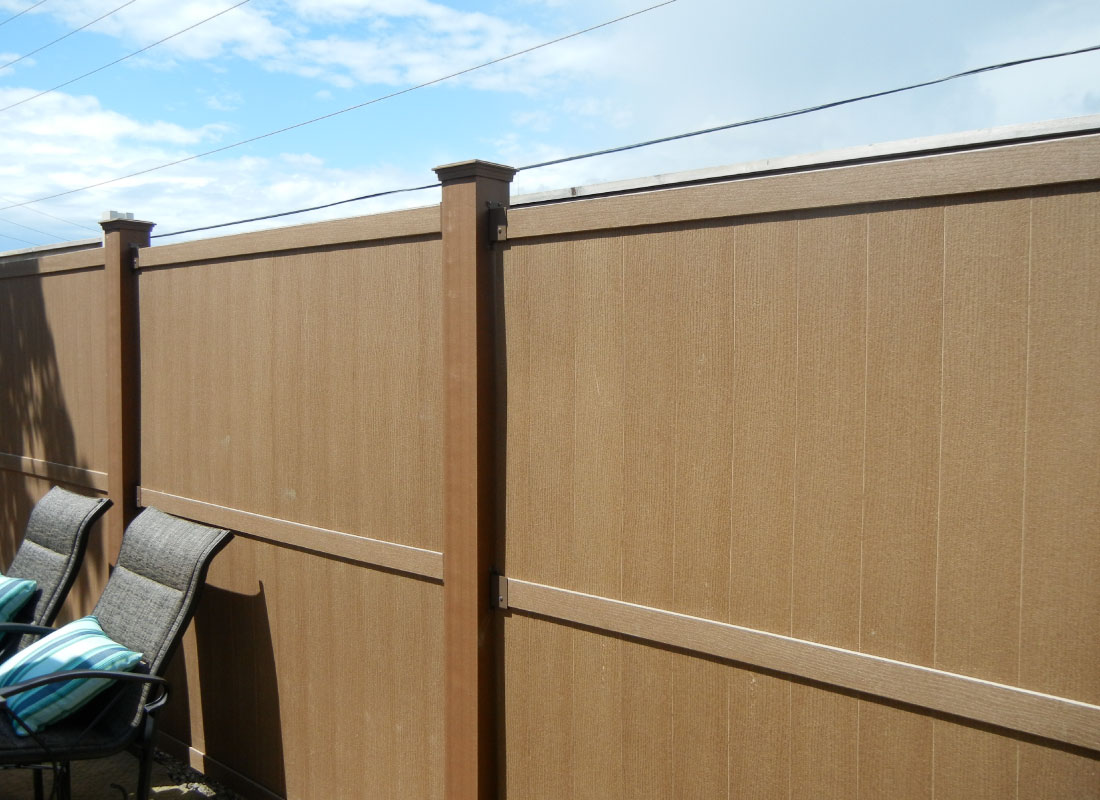 Pressure-Treated Privacy Fence installed in Nepean, Ontario by Fence Masters Ottawa — Pressure-treated privacy panels installed on frost-depth footings